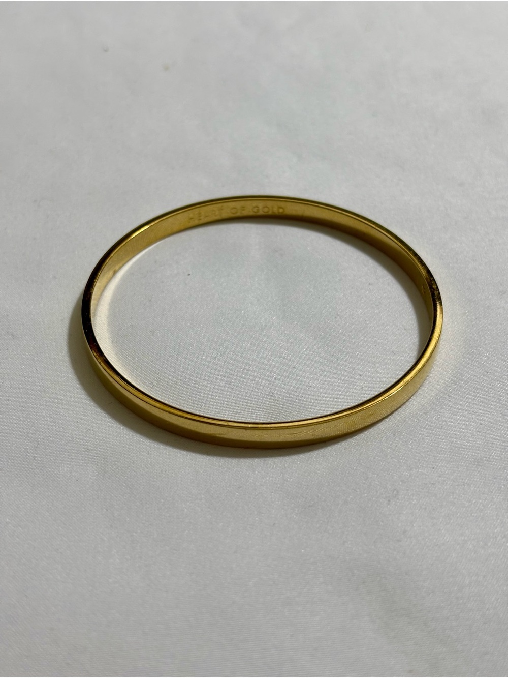 Kate spade gold plated heart of gold bangle